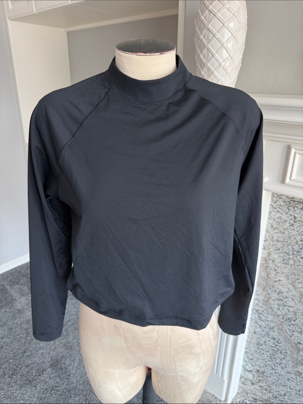 Athleta Black Mock Neck Rash Guard - Swim top.